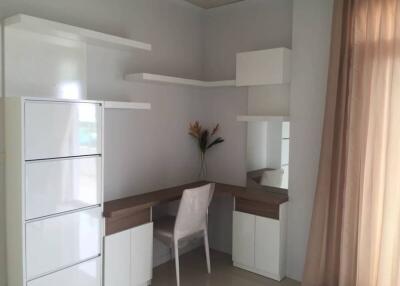 Modern minimalist kitchen with dining area