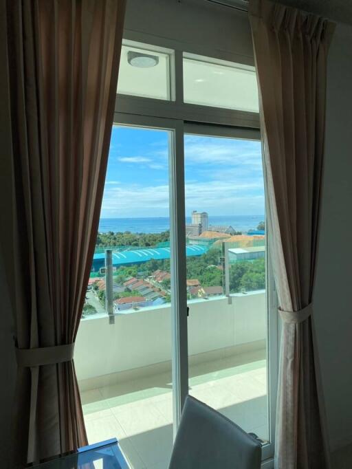 Bedroom with ocean view and ample natural light