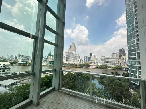 Spacious balcony with panoramic city and river views