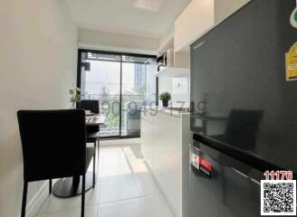 Modern kitchen with dining area and large window