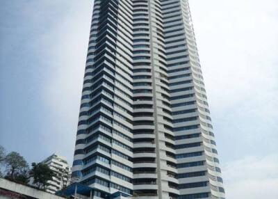 Modern high-rise residential building exterior with balconies