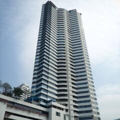 Modern high-rise residential building exterior with balconies