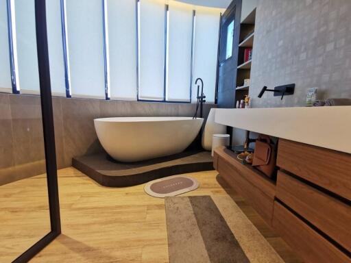 Modern bathroom with freestanding tub and elegant finishes