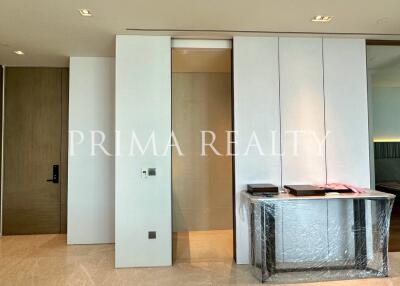Modern building interior with a minimalist design and large white doors