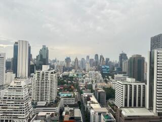 Cityscape view from a high-rise building window