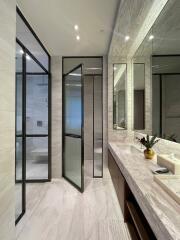 Modern designed bathroom with marble finishes and double vanity sink