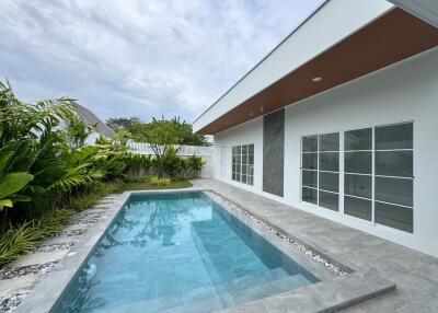 Modern house exterior with swimming pool