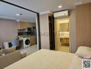 Compact bedroom with integrated living and kitchenette area