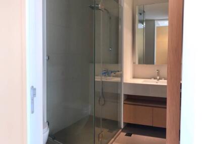 Modern bathroom with glass shower and vanity