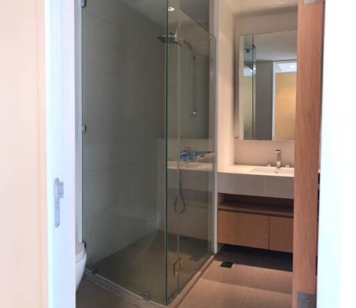 Modern bathroom with glass shower and vanity