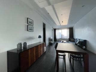 Modern living room with city view from high-rise apartment