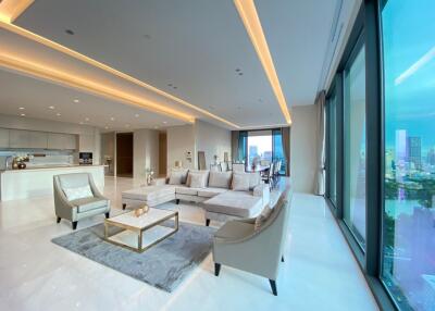 Spacious and modern open-plan living room with cityscape view