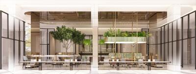 Modern building interior with open-plan layout, dining tables, and lush greenery