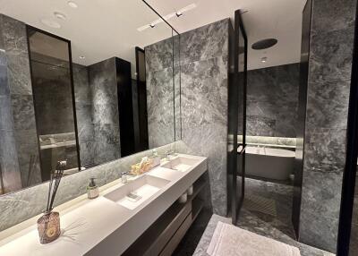 Modern bathroom with marble finish and elegant fixtures