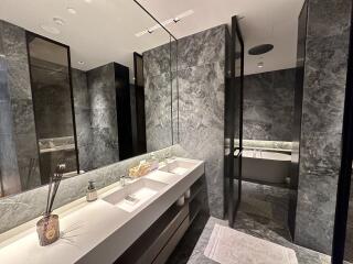 Modern bathroom with marble finish and elegant fixtures