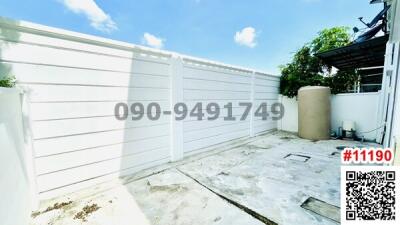 Spacious private outdoor area with high fence for privacy