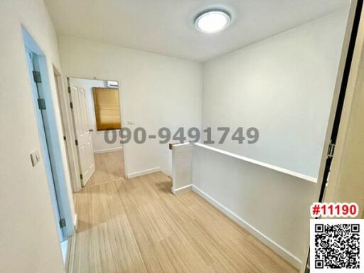 Empty bedroom with wood flooring