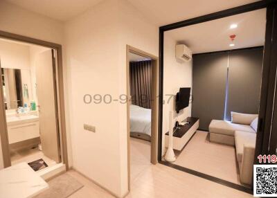 Modern bedroom with en suite bathroom and mirrored wardrobe