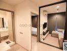 Modern bedroom with en suite bathroom and mirrored wardrobe