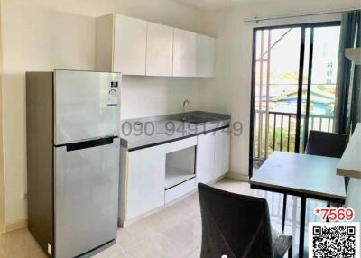 Bright kitchen with modern appliances and dining area