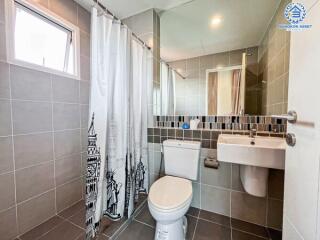 Modern bathroom interior with shower and toilet