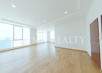 Spacious and Bright Empty Living Room with Hardwood Floors