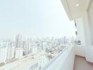 City view from high-rise apartment balcony