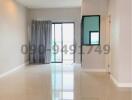 Spacious empty room with glossy tiled floor and large windows