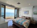 Bedroom with ocean view and balcony access