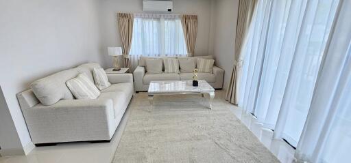 Elegant living room interior with modern furniture and stylish decor
