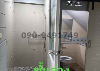 Modern bathroom with shower and toilet facilities
