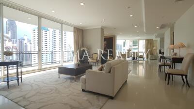 Spacious and well-lit living room with city view