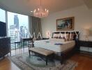 Spacious and elegant bedroom with city view