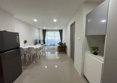 Spacious kitchen with modern appliances and dining area