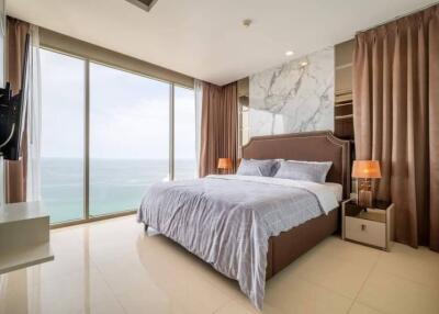 Modern bedroom with ocean view and ample natural light