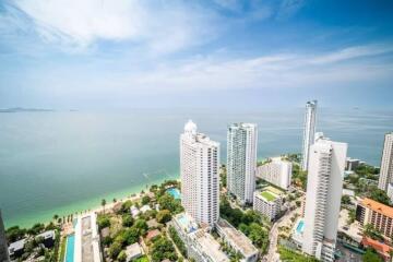 Aerial view of coastal high-rise buildings with ocean front