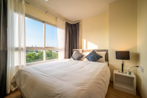 Bright and airy bedroom with large window