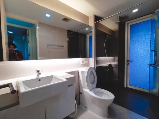 Modern bathroom interior with blue accent lighting