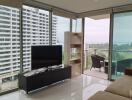 Modern living room with large windows and contemporary furniture