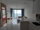 Modern living space with kitchenette and view of the ocean