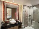 Modern bathroom with LED mirror and glass shower