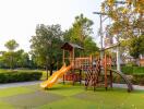 Children's playground with slide and swings in a residential area