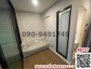 Compact bedroom with en-suite bathroom and air conditioning unit