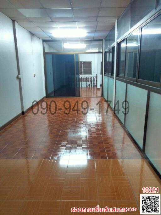 Spacious interior of a commercial building with tiled flooring