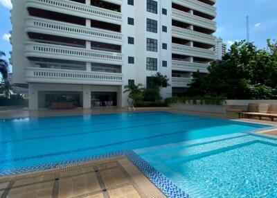 High-rise residential building with outdoor swimming pool