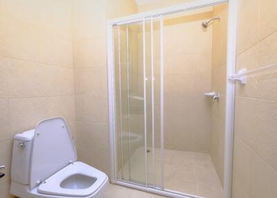 Modern bathroom with shower enclosure and toilet