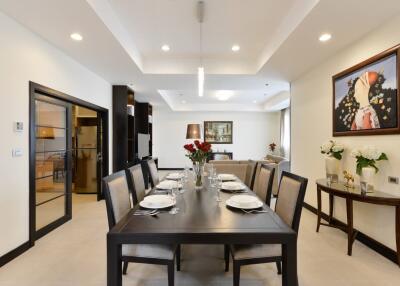 Elegant dining room with large table and modern decor