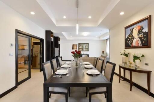 Elegant dining room with a large table and modern decor
