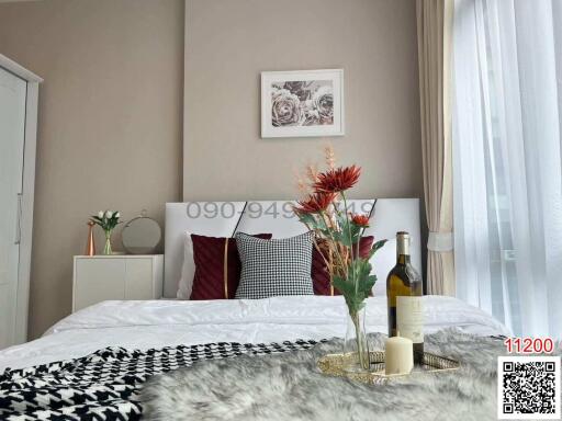 Modern cozy bedroom with neutral tones and stylish decor