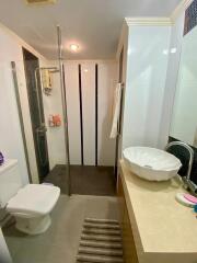 Modern bathroom with shower cabin and vanity area